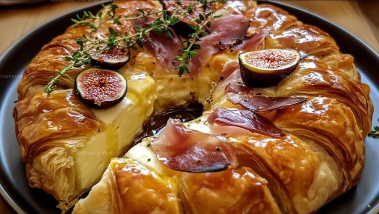 Baked Brie In Puff Pastry With Honey, Fig, And Prosciutto Recipe